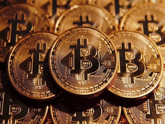 比特币btc 创下112万美元新高